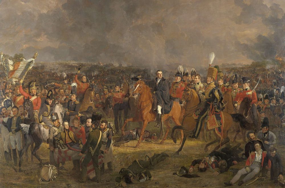 Oil painting: Wellington on horseback among his staff, the battle continuing in the distance